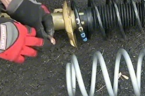 汽车减震弹簧压多少